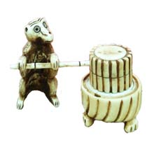 OX BONE CARVED MONKEY PUSH MILLSTONE