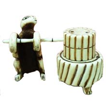 OX BONE CARVED TURTLE PUSH MILLSTONE